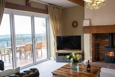 Image de Luxury cottage with stunning views, hot tub and 2 dogs welcome