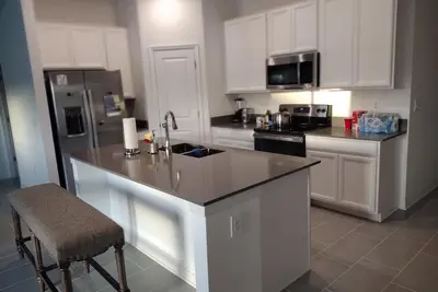 Image de New House 25 Minutes from Disney World  with King  size bed and Community Pool.
