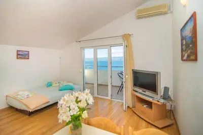 Image de Appartement dans Dugi Rat avec vue mer, terrasse, Climatisation, Wifi (5113-4)