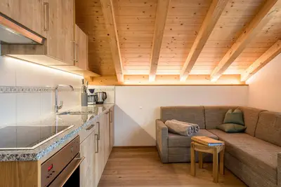 Image de Appartement \"Feldererhof Apt Dolomitenblick\" avec vue sur les montagnes, jardin partagé et Wi-Fi.