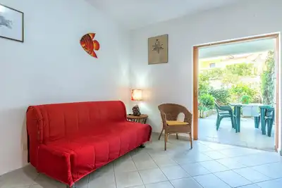 Image de Appartement \"A Due Passi Apartment\" avec terrasse privée, jardin privé et climatisation.