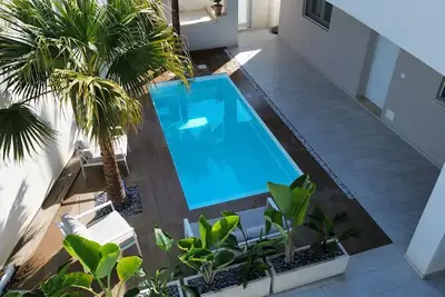 Image de Villa 'Kennedy' avec vue sur la mer, piscine privée et climatisation