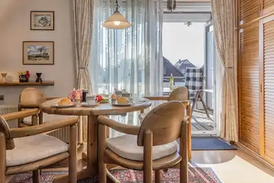 Image de The simply furnished vacation apartment Lee in Haus Utkiek in Carolinensiel awaits you.