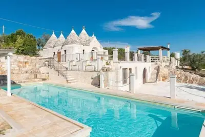 Image de Trullo Il Pupineto avec piscine à Ostuni