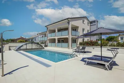 Image de Bel appartement pour 6 personnes avec piscine, Wifi, climatisation, Tv, terrasse et parking