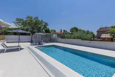 Image de Bel appartement pour 4 personnes avec climatisation, Wifi, piscine, Tv, terrasse et parking