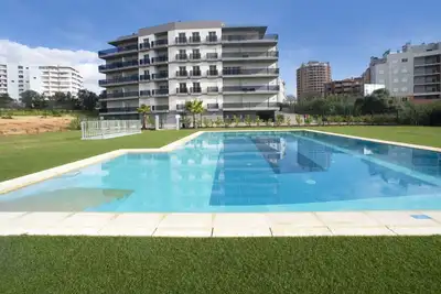 Image de Joli appartement pour 4 personnes avec Wifi, climatisation, piscine, Tv, terrasse et parking