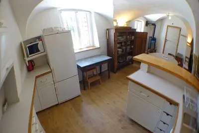 Image de Studio de 60 m2 dans l’ancienne étable vouté d’une grande maison du XVIIe siècle