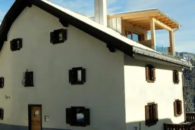 Image de Ferienhaus Tgioc by Interhome