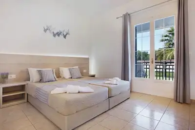 Image de JAppartement de vacances \"Tropical 1\" avec jardin partagé, A/C et Wi-Fi