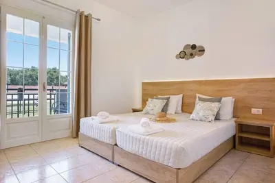 Image de Appartement de vacances \"Tropical 4\" avec jardin partagé, climatisation et Wi-Fi.