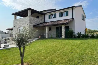 Image de Maison de vacances Brtonigla pour 1 - 8 personnes avec 4 chambres à coucher - Maison de vacances