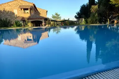 Image de Appartement de vacances Chianni pour 2 - 4 personnes avec 2 chambres à coucher - Maison jumelée