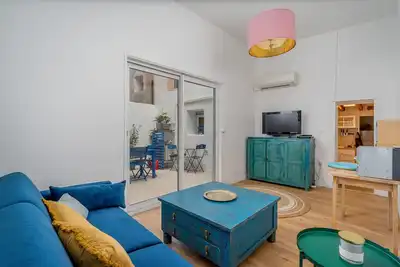 Image de Duplex 4 pers. centre avec cour privée ensoleillée