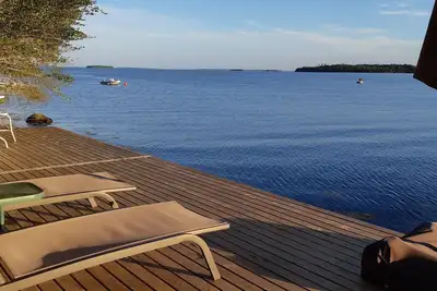 Arm's length from the sea, private cove beach. Easy to access town and city.