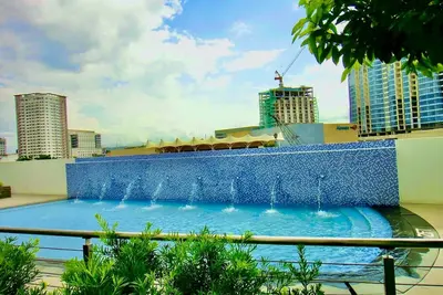 Image de Condo in Abreezaplace  with Wifi and Netflix