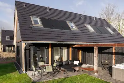 Image de Logement mitoyen pour 4 personnes avec espace bien-être