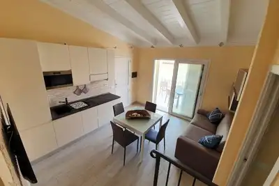 Image de Appartement \"Caprera\" avec terrasse privée, Wi-Fi et climatisation.