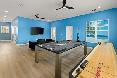 Image de Sandy Harbor | Stunning New Beach Home ft. Pirate Theme Room, Arcade & More