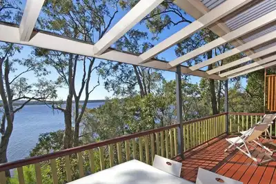 Image de Noosa Deluxe Cottage (1 bdrm)  - lakefront retreat. Double spa and wood fire
