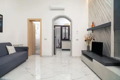 Image de Maison de vacances 'Manuela House' avec terrasse privée et climatisation.