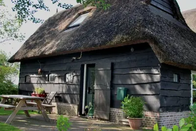 Image de Maison de vacances א Ruinerwold avec jardin