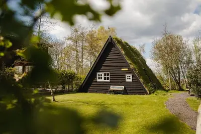 Image de Maison de vacances א Ruinerwold avec jardin