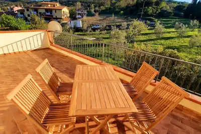 Image de A few km from the sea, close to bike trails. Pleasant house with terrace and view!