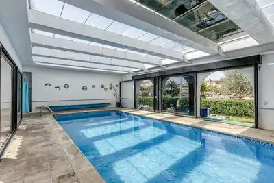 Image de Appartement 'Art-Apartamentos Revilla Tacke A' avec vue sur la mer, piscine partagée et Wi-Fi