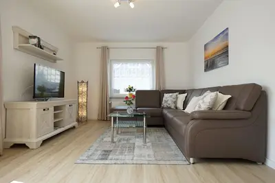 Image de Ferienhaus Küstenglück mit Terrasse und Strandkorb