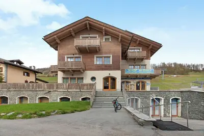 Image de Appartement 'Baita Valandrea 3' avec vue sur les montagnes, jardin partagé et Wi-Fi