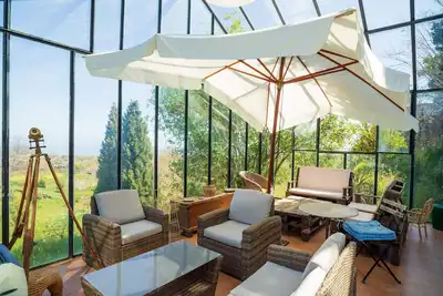 Image de Maison de vacances 'Etnalodge' avec vue sur la mer, terrasse privée et Wi-Fi.