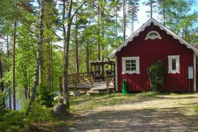 Image de 2 holiday homes with sauna and whirlpool directly on the lake