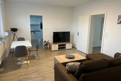 Image de A modern renovated apartment with balcony terrace.