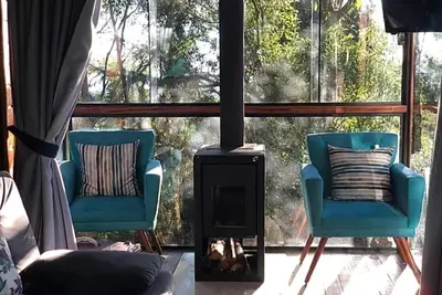Image de Very cozy wooden chalet with glass gazebo and fireplace.