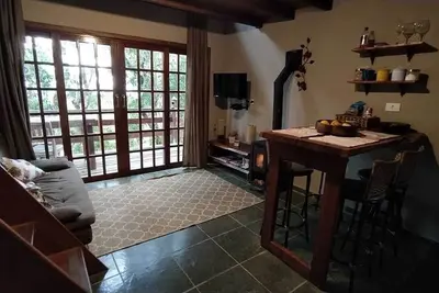 Image de Family chalet with fireplace and exclusive deck overlooking nature.
