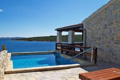 Image de Maison pour la famille près de la mer et avec la piscine Baie Lanđin, Pasman (K-20399)