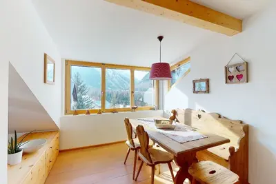 Image de Renovated small loft furnished in alpine style perfect for couples or families.