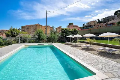 Image de Maison de vacances 'Il Gattino Di Porto Appartamento 4' avec piscine partagée