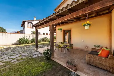 Image de Maison de vacances 'Girasole' avec terrasse privée, jardin et climatisation