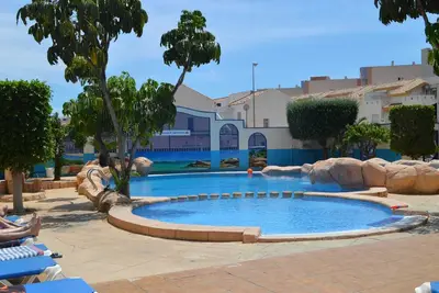 Image de Appartement de vacances \"En El Cabo Roig\" avec piscine partagée, balcon privé et Wi-Fi