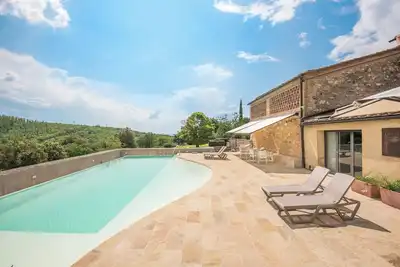 Image de Appartement 'Brotes Appartamento Mandorlo' avec piscine partagée, Wi-Fi et climatisation.