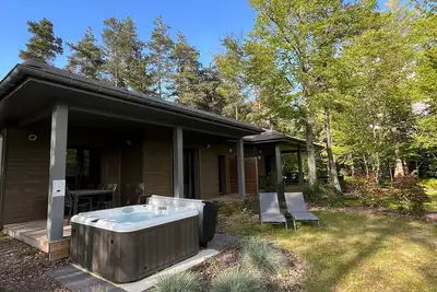 Image de Lodge familial avec jacuzzi privatif, accès piscine et nombreuses activités au bord du golf