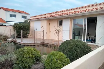 Image de Maison cosy à La Chaume, jardin, véranda, 3 chambres, proche quais et piscines