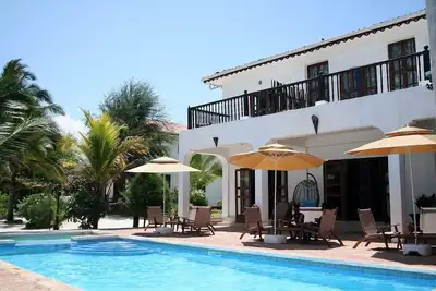 Cozy Beach Front villa with pool in Uroa