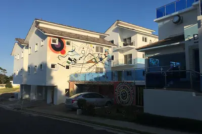 Image de Newly Built Club Style Condo in Walking Distance to the Beach and Amenities