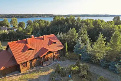 Image de Comfortable vacation home with lots of privacy and private access to a huge lake