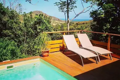 Image de kay pirina : lodge romantique avec piscine et vue mer