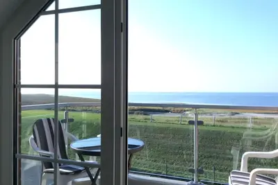 Image de Vacation apartment 11 in Haus Nordseedüne in Cuxhaven Duhnen - for up to 4 people with a full sea view