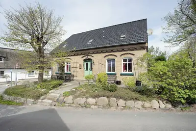 Image de Appartement Kapitaensferienhaus Hafenblick avec terrasse partagée et Wi-Fi